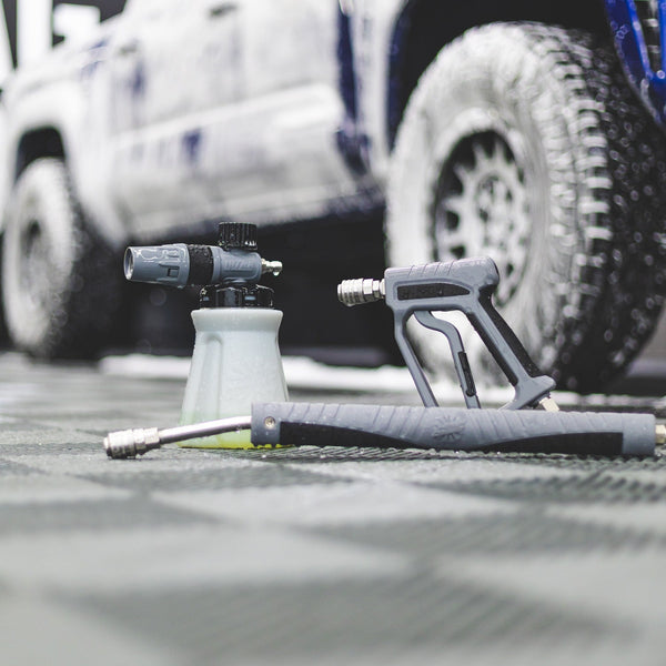 Ultra H2O Foam Cannon, Spray Gun and Spray Wand in front of a foamed vehicle